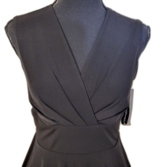 Black Ruffled Peplum V-Neck Mini Dress - Picture 2 of 11